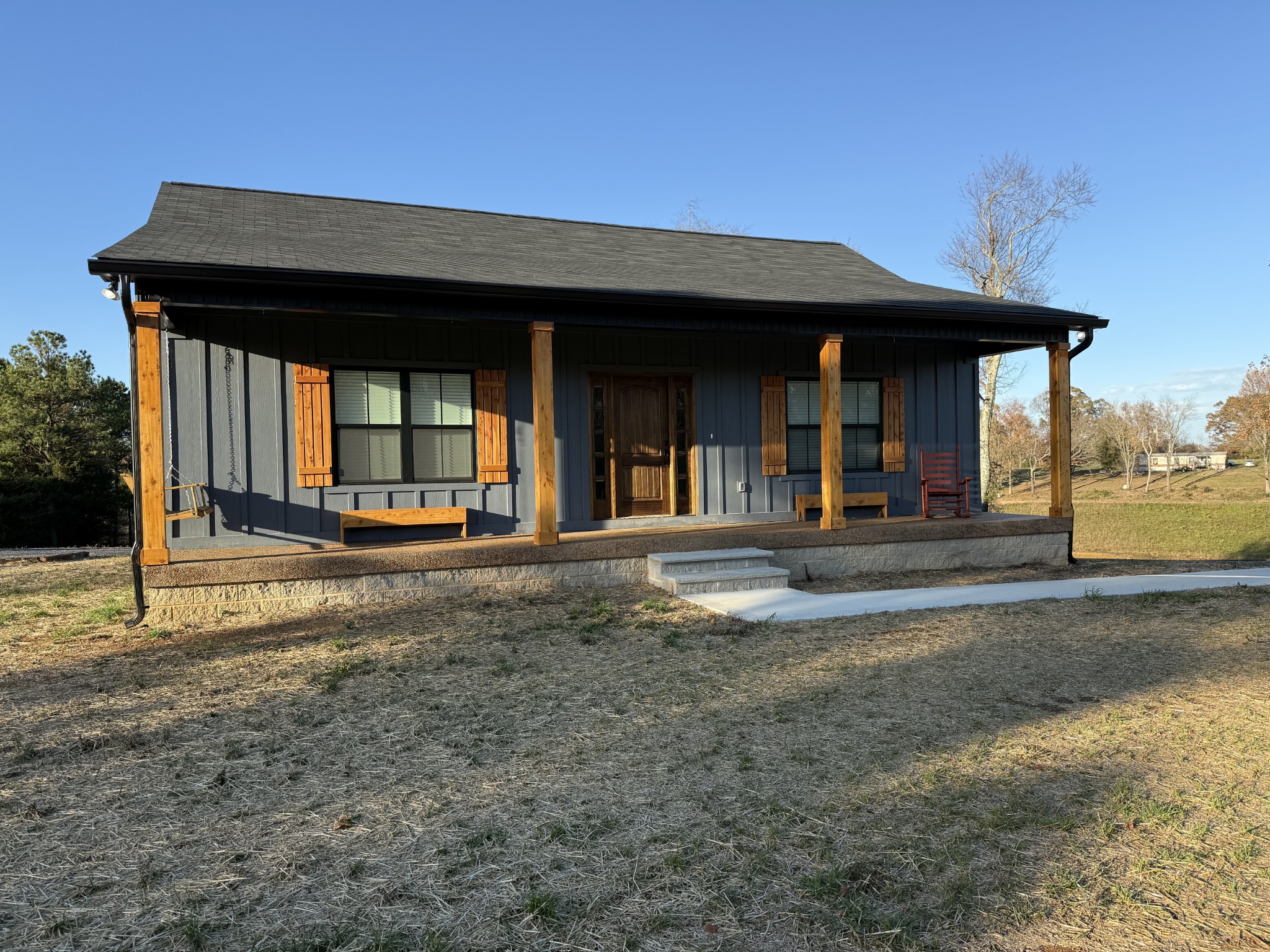 9461 Short Mountain Road Smithville, TN 37166 - Photo 23 of 26 a view of a house with a porch