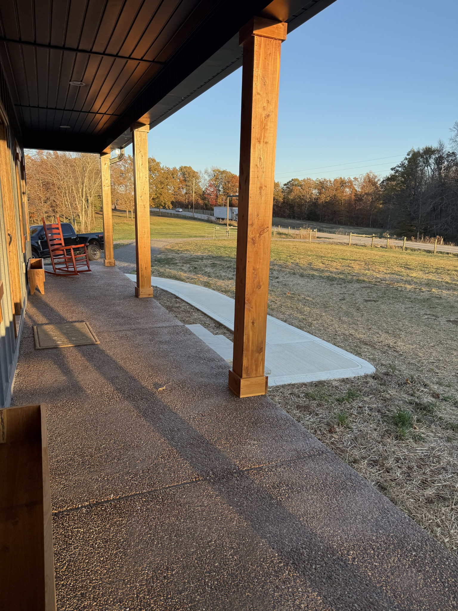 9461 Short Mountain Road Smithville, TN 37166 - Photo 5 of 26 a view of a porch with furniture and a yard