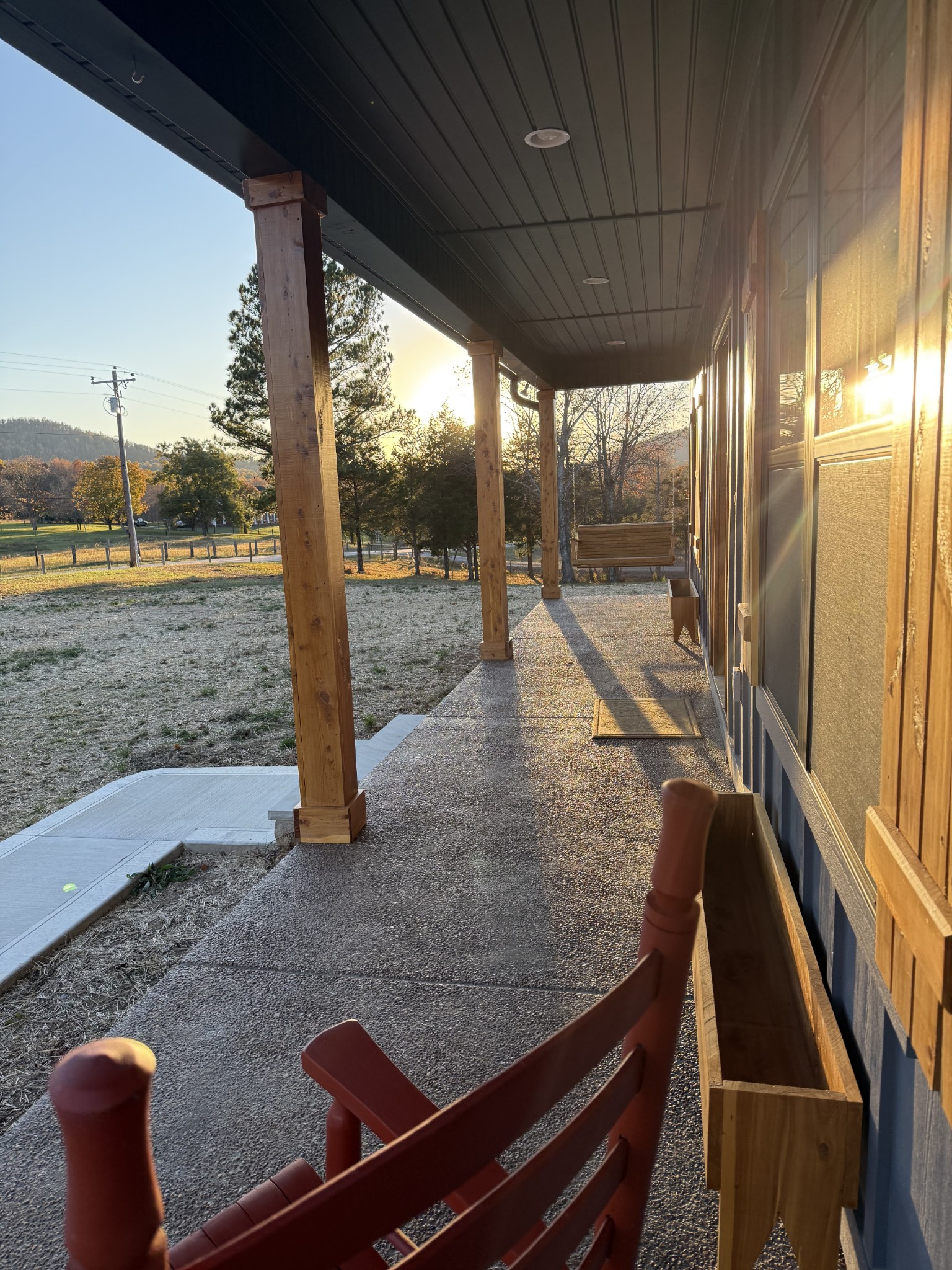 9461 Short Mountain Road Smithville, TN 37166 - Photo 6 of 26 a view of a floor to ceiling window and wooden floor