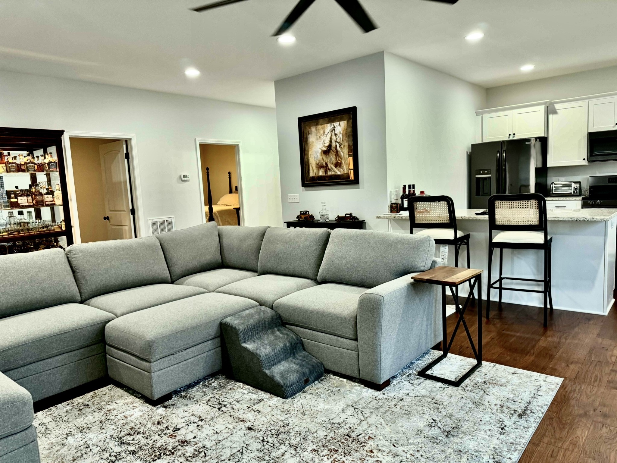 9461 Short Mountain Road Smithville, TN 37166 - Photo 7 of 26 a living room with furniture and a flat screen tv