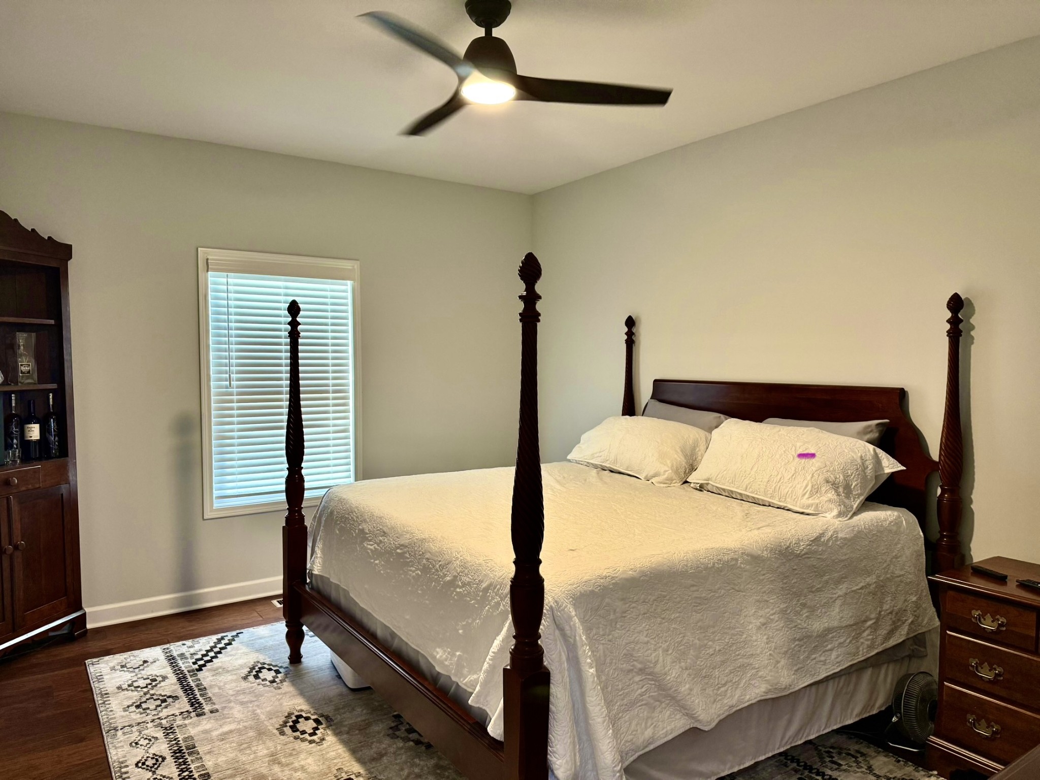 9461 Short Mountain Road Smithville, TN 37166 - Photo 8 of 26 a bedroom with a bed and a dresser