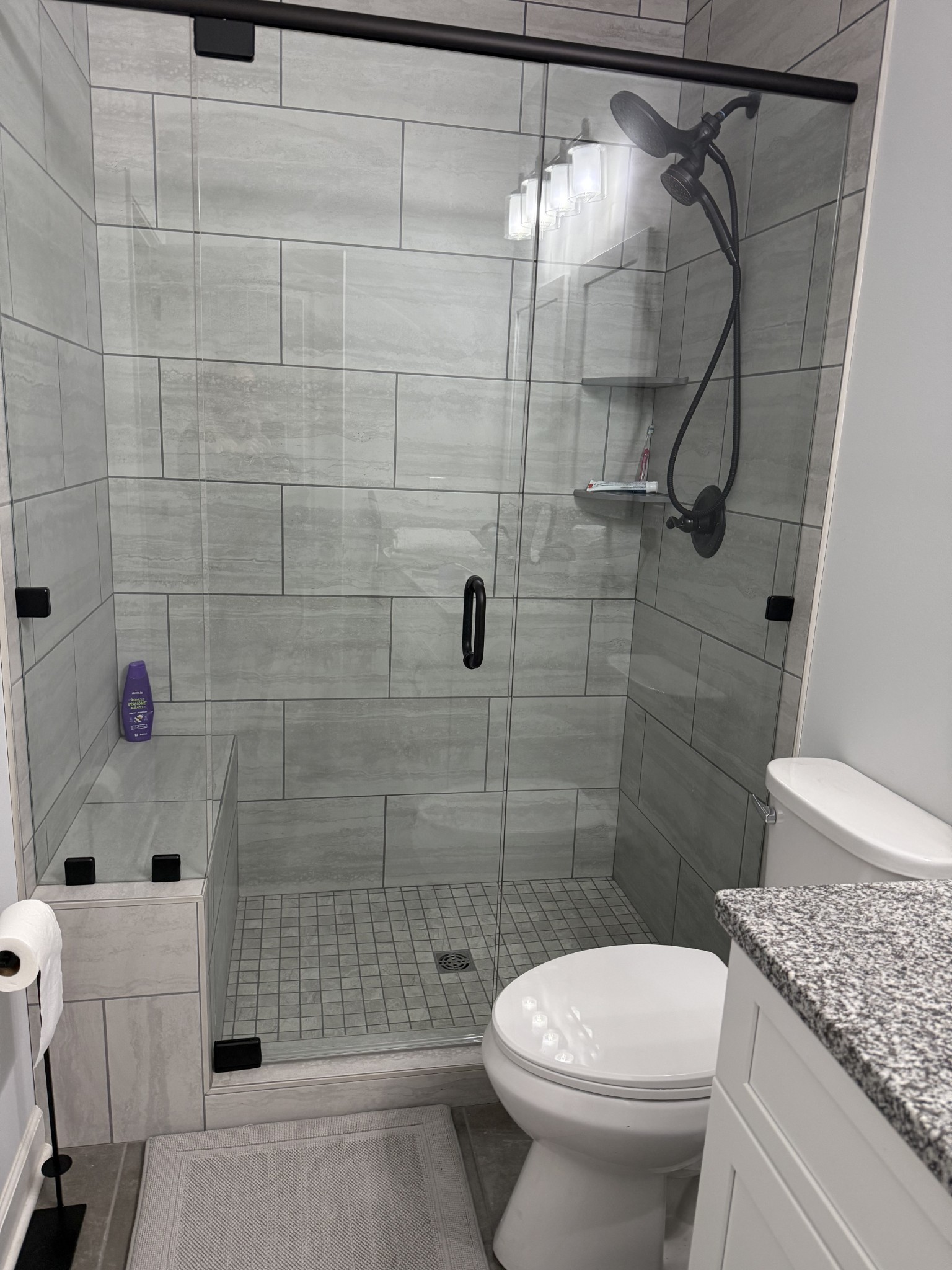 9461 Short Mountain Road Smithville, TN 37166 - Photo 10 of 26 a bathroom with a toilet and shower