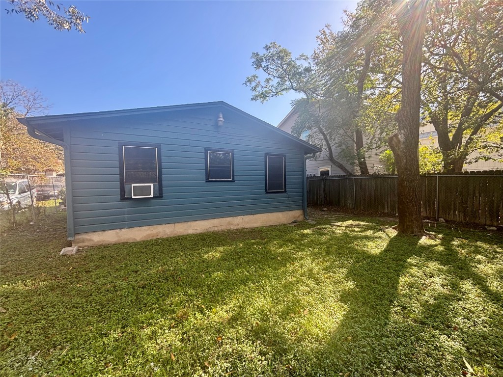 1606 Singleton Avenue Austin, TX 78702 - Photo 22 of 25 a backyard of a house