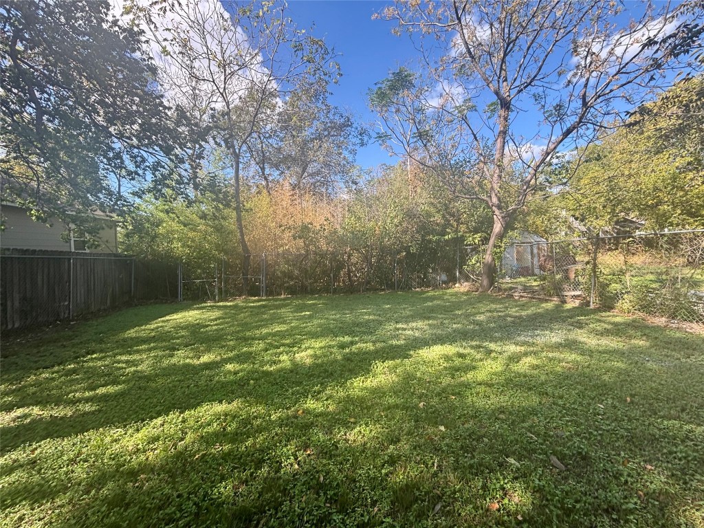 1606 Singleton Avenue Austin, TX 78702 - Photo 23 of 25 a view of outdoor space with deck and yard