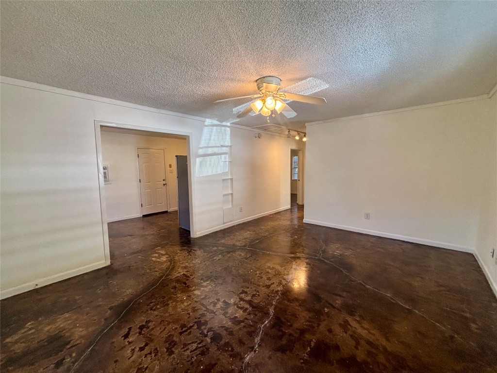 1606 Singleton Avenue Austin, TX 78702 - Photo 3 of 25 wooden floor in an empty room