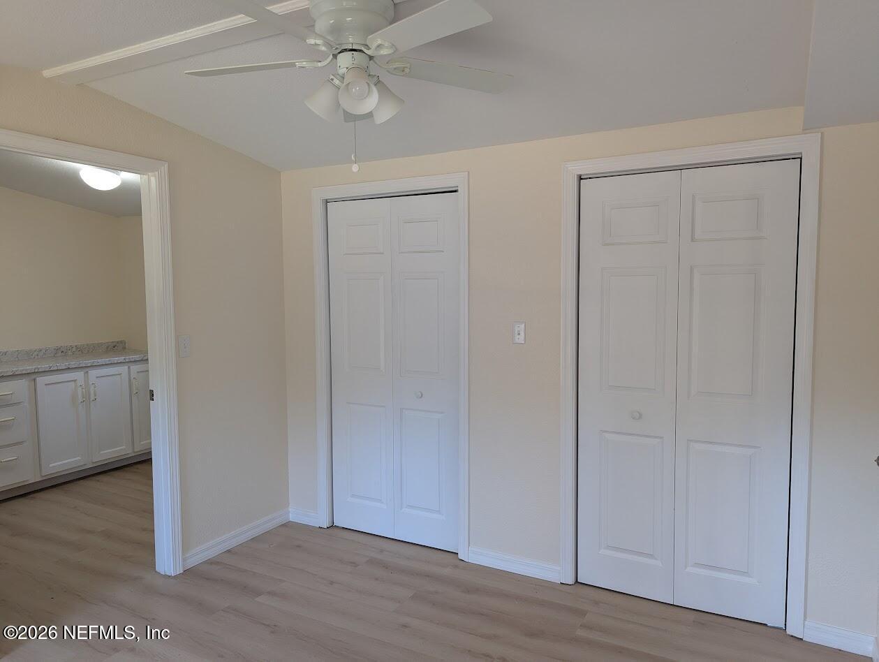 119 Walter Avenue Interlachen, FL 32148 - Photo 13 of 21 wooden floor in an empty room