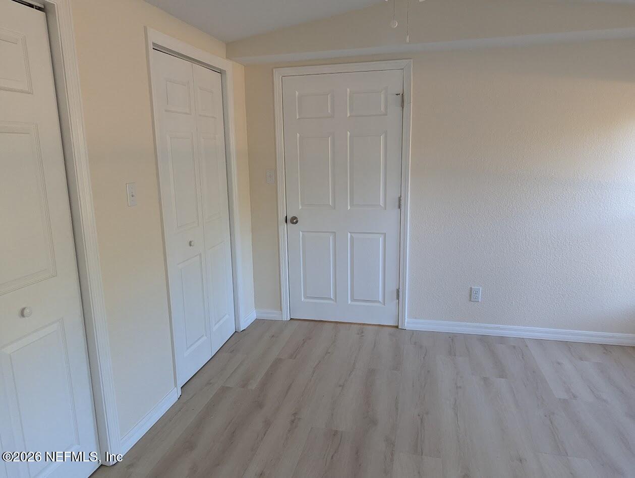 119 Walter Avenue Interlachen, FL 32148 - Photo 14 of 21 a view of room with hardwood floor