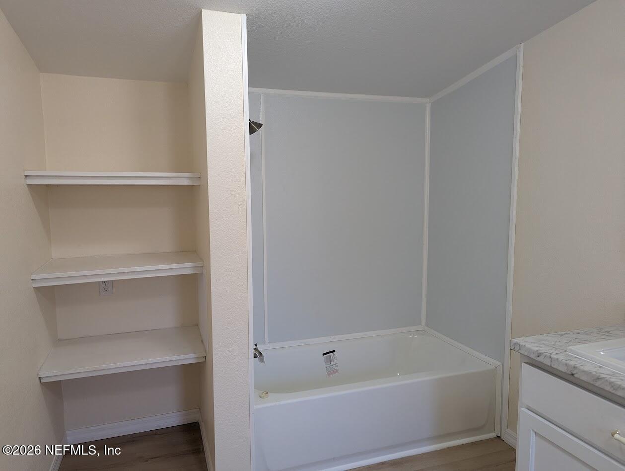 119 Walter Avenue Interlachen, FL 32148 - Photo 17 of 21 a bathroom with a bathtub