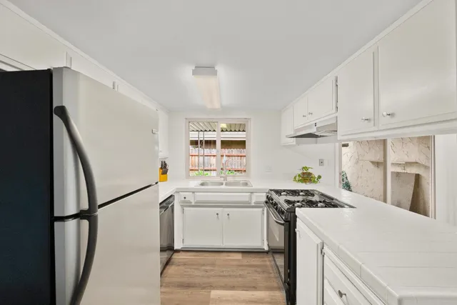 an empty room with sliding glass door