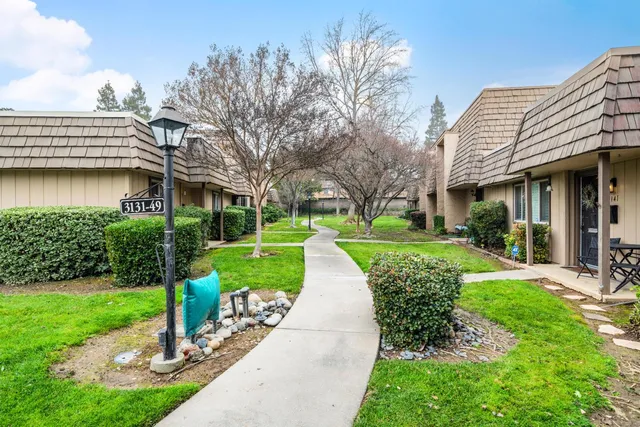 a view of a house with garden