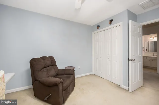 a livingroom with furniture and a window