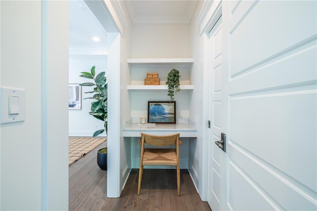 538 Ansley Street Decatur, GA 30030 - Photo 37 of 73 a bedroom with a bed and a table in it