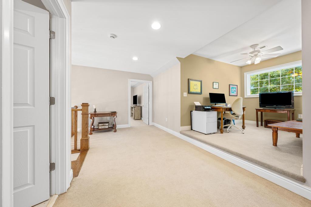 217 Maret Road Townville, SC 29689 - Photo 23 of 35 A versatile bonus room provides a bright home office space or additional relaxation area.