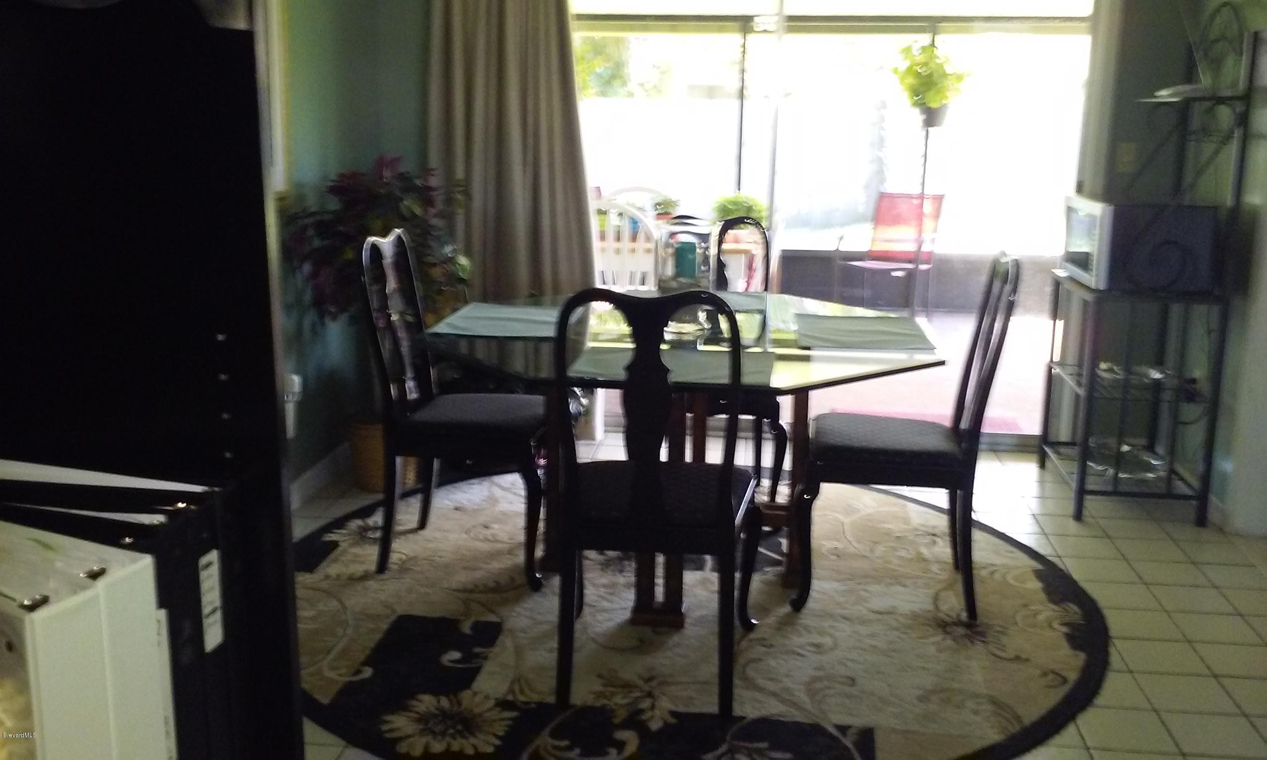 1294 Ne Port Palm Bay, FL 32905 - Photo 11 of 26 DINING ROOM 1