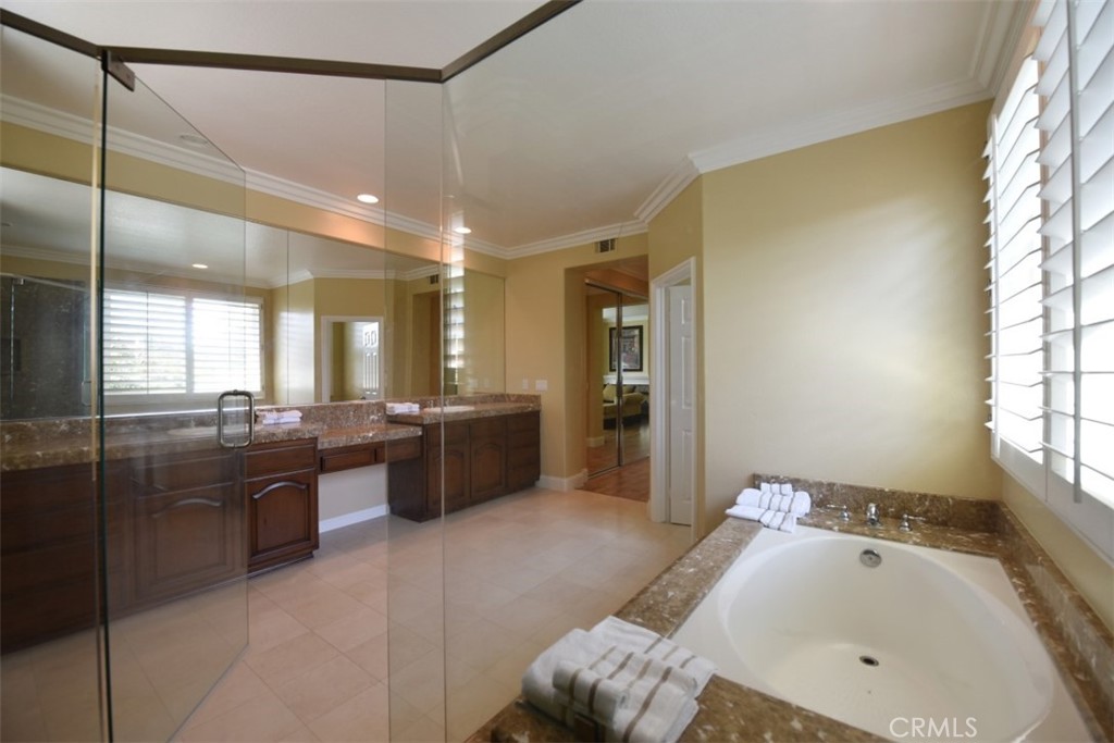 12 Brigadier Irvine, CA 92603 - Photo 36 of 50 a large bathroom with a large tub and sink