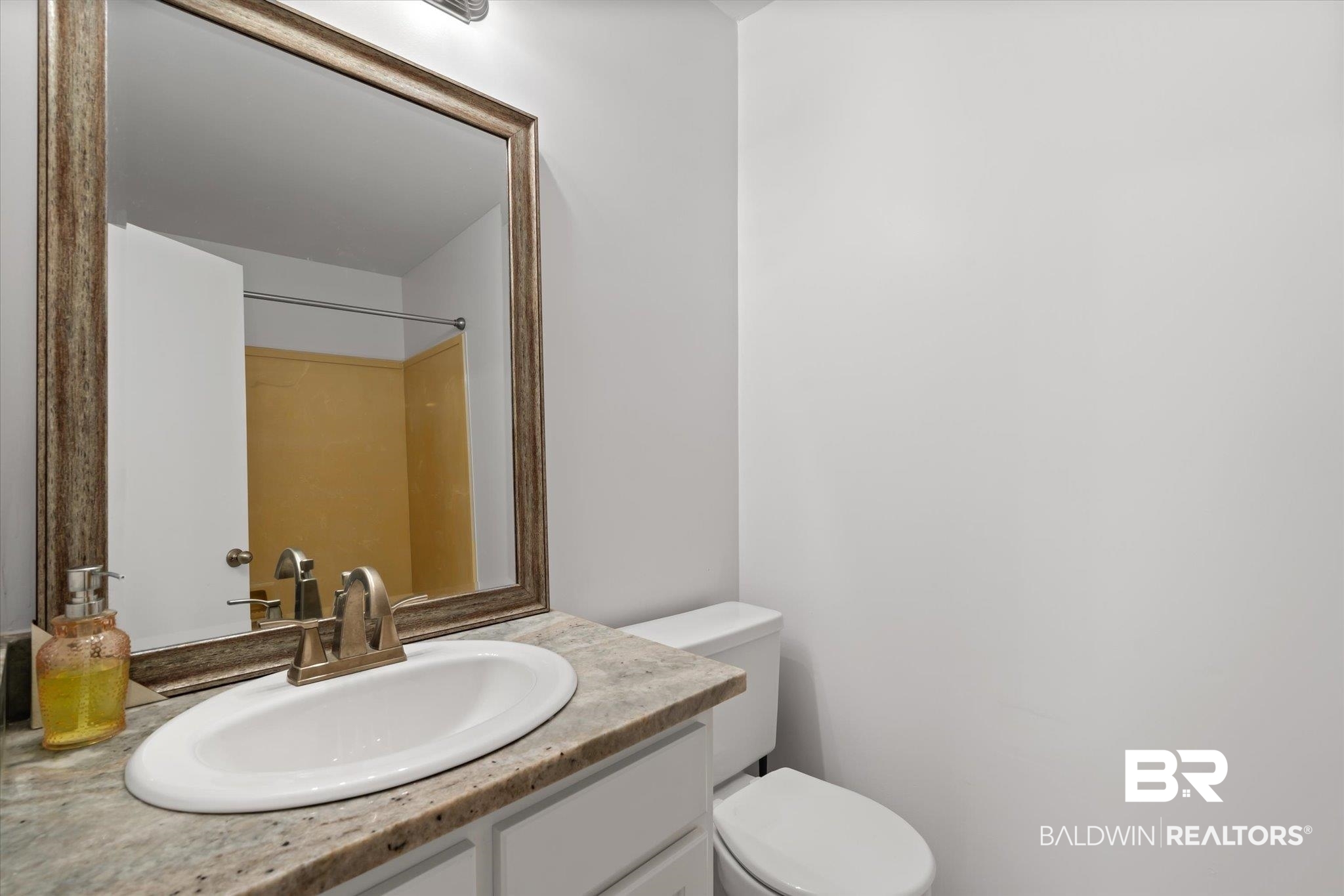 1008 Mcneil Avenue Mobile, AL 36609 - Photo 14 of 20 Bathroom with vanity and toilet