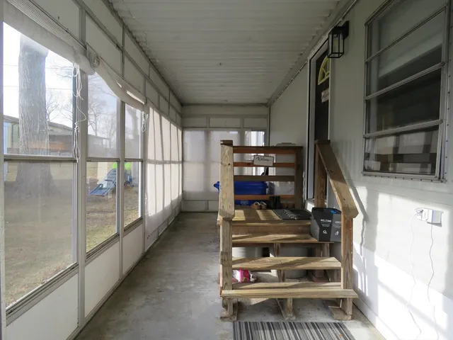 a view of entryway with wooden floor