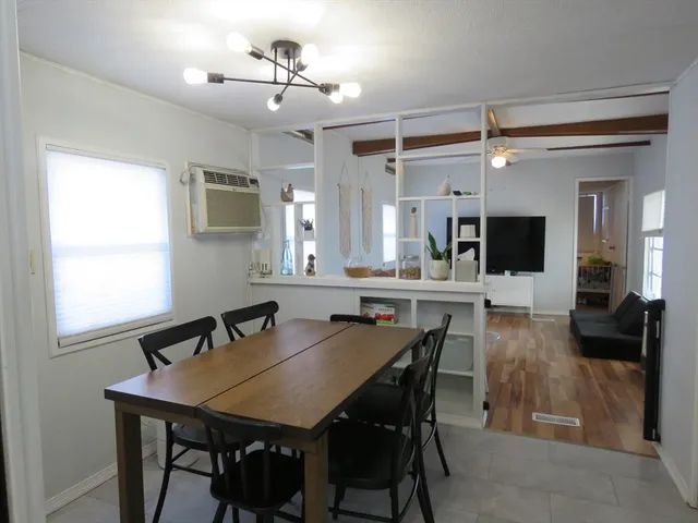 a view of a dining room with furniture