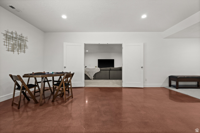 507 West Windmill Gate Cove Draper, UT 84020 - Photo 37 of 46 Dining area featuring finished concrete flooring and recessed lighting