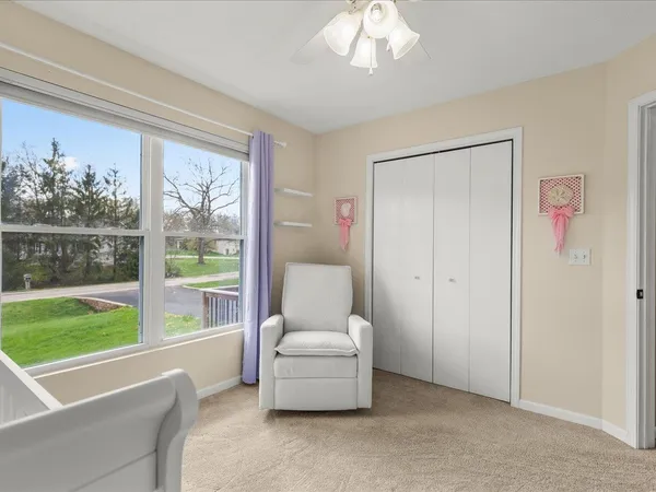 a living room with furniture and a window