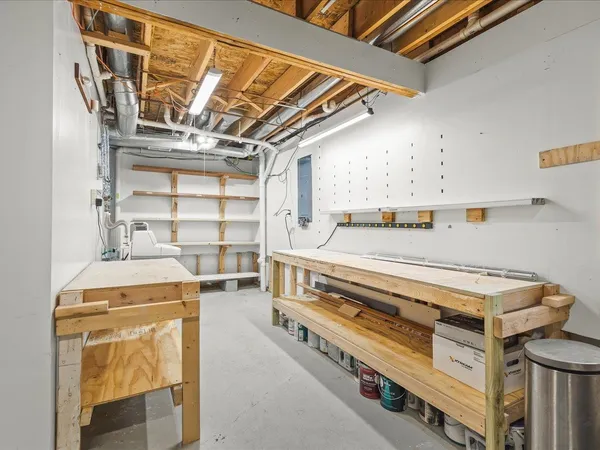 a view of storage and utility room with washer and dryer