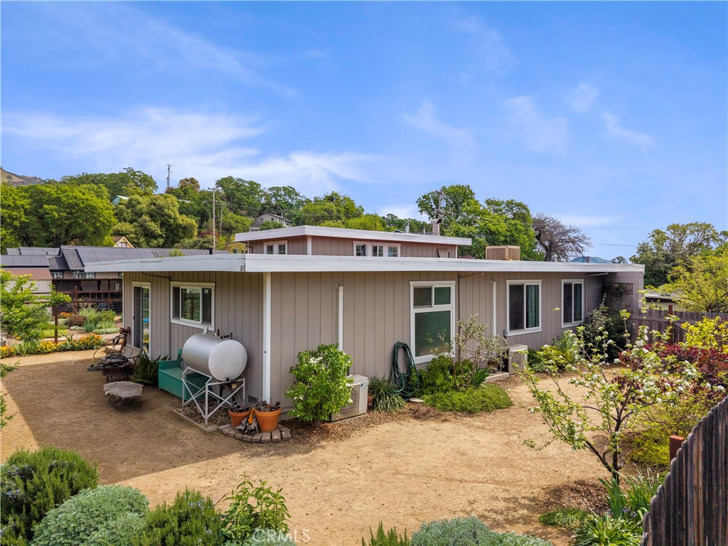 2800 Merced Street Nice, CA 95464 - Photo 42 of 49 Back yard. landscaped with shrubs and fruit trees