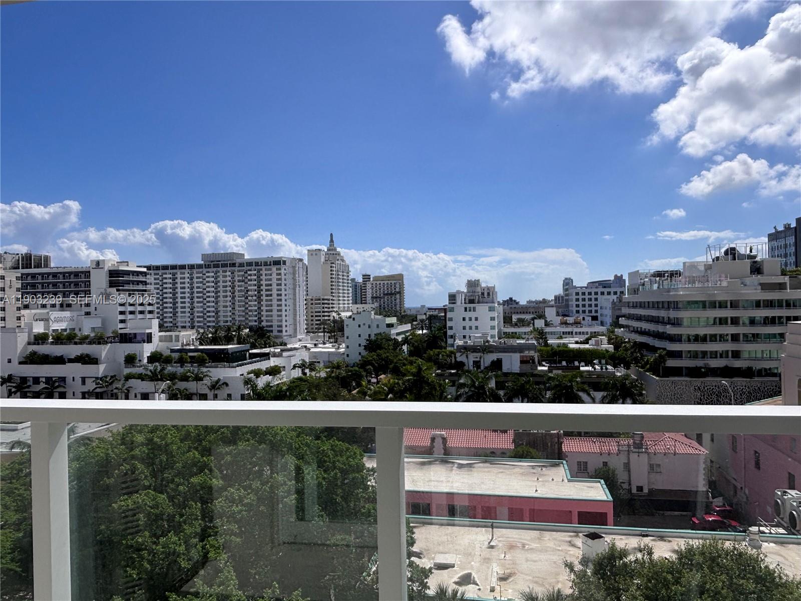 a view of a city with tall buildings