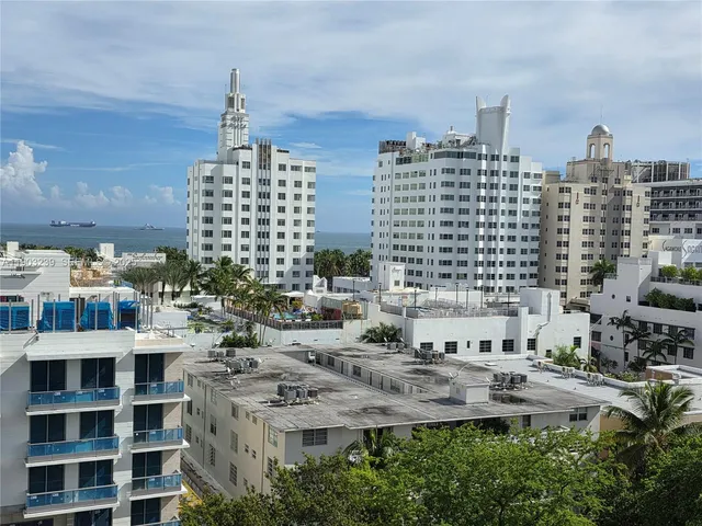 a view of city with tall buildings
