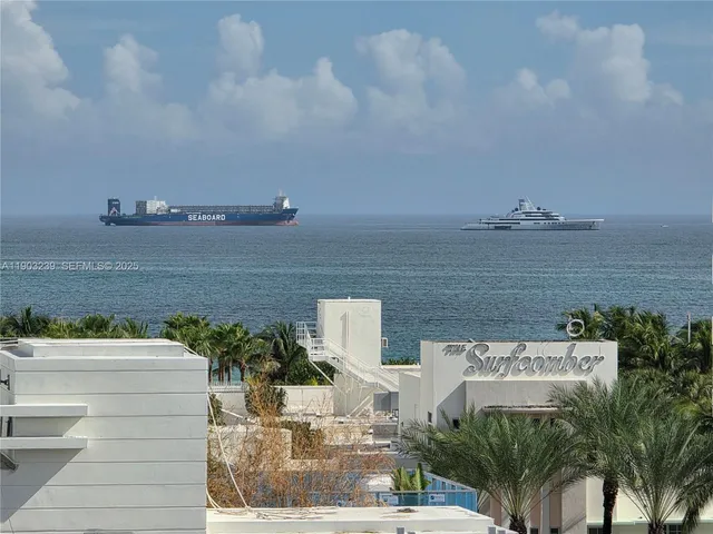 a view of building with an outdoor space and seating