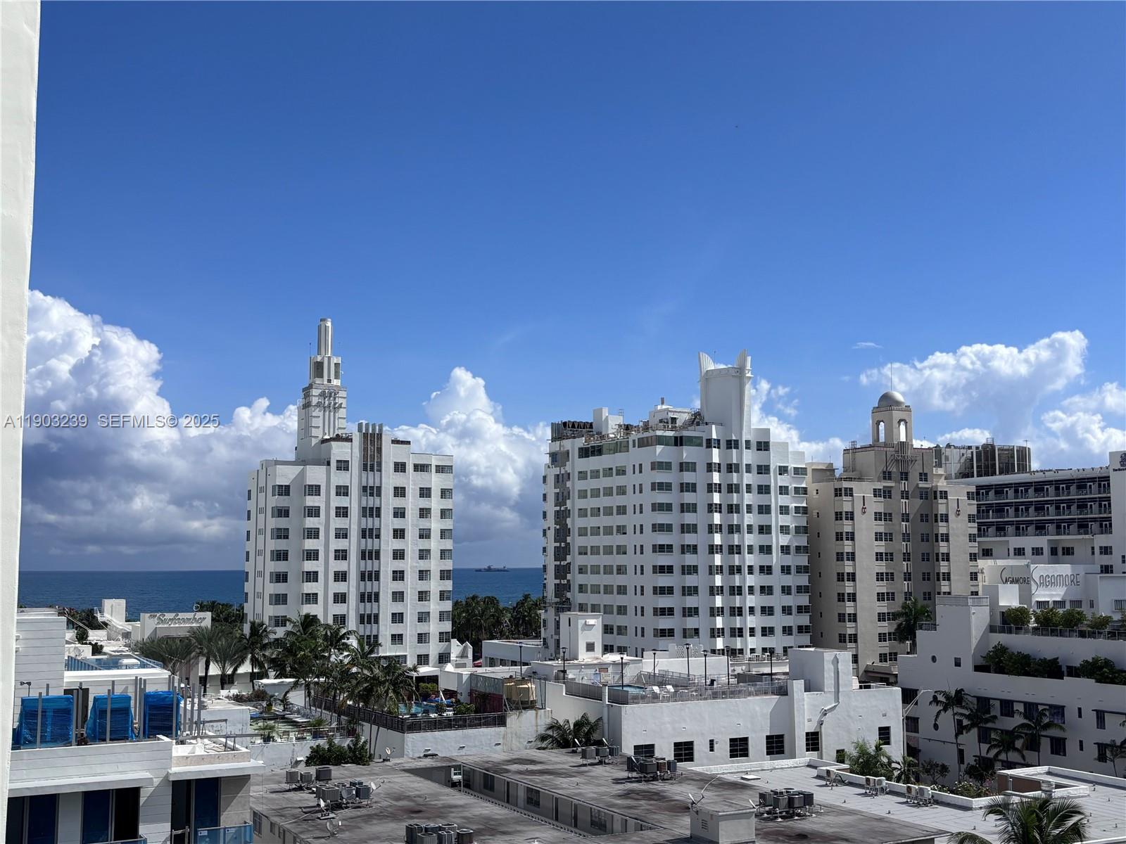 1750 James Avenue, Unit 9C Miami Beach, FL 33139 - Photo 4 of 28 a view of large building with a city street
