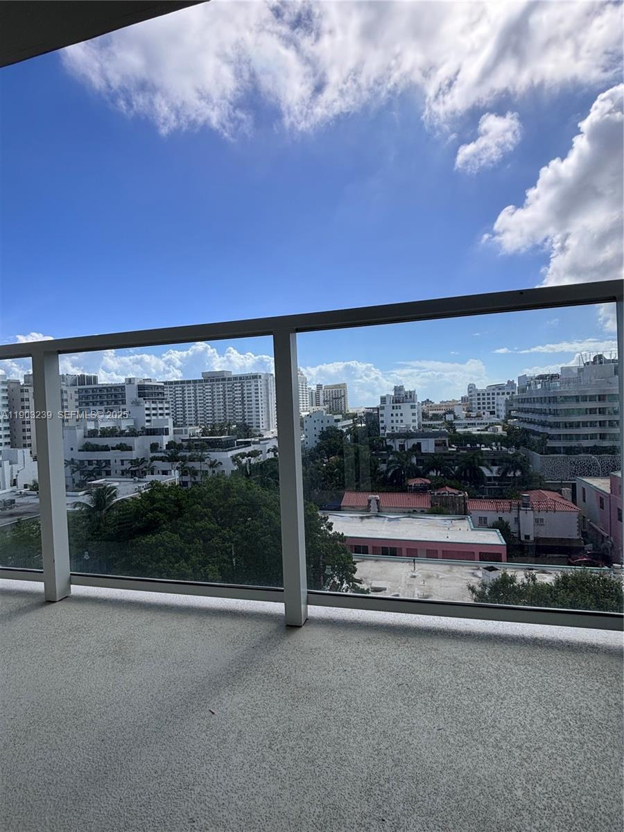 1750 James Avenue, Unit 9C Miami Beach, FL 33139 - Photo 5 of 28 a view of a city from a balcony