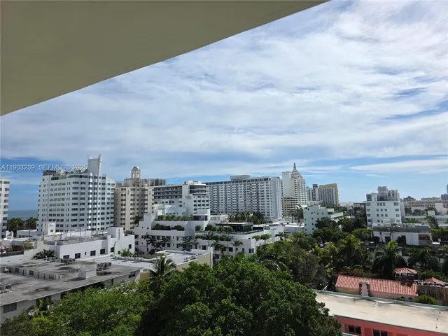 a view of a city with tall buildings