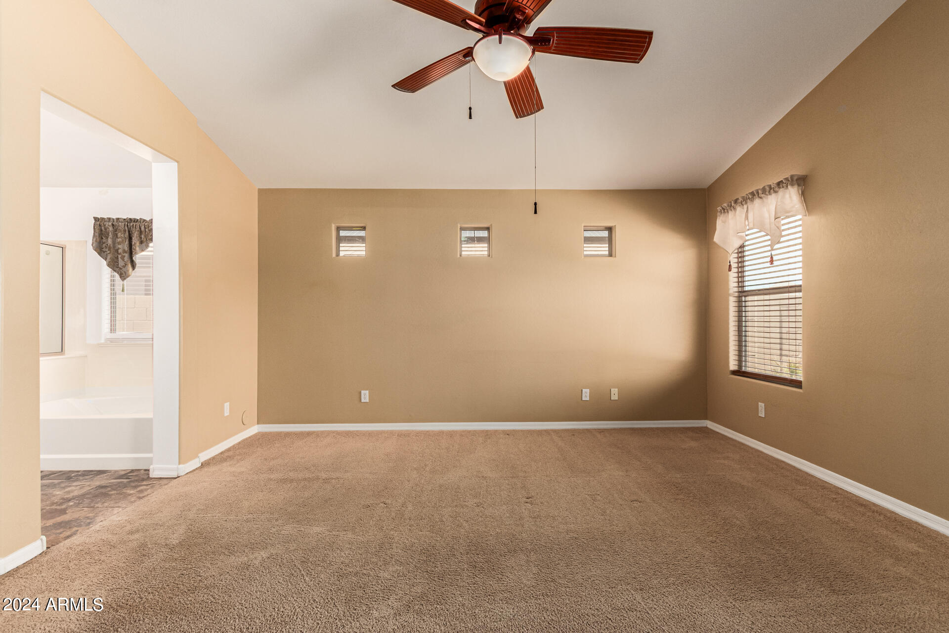 25602 West Ripple Road Buckeye, AZ 85326 - Photo 16 of 38 a view of an empty room with a window