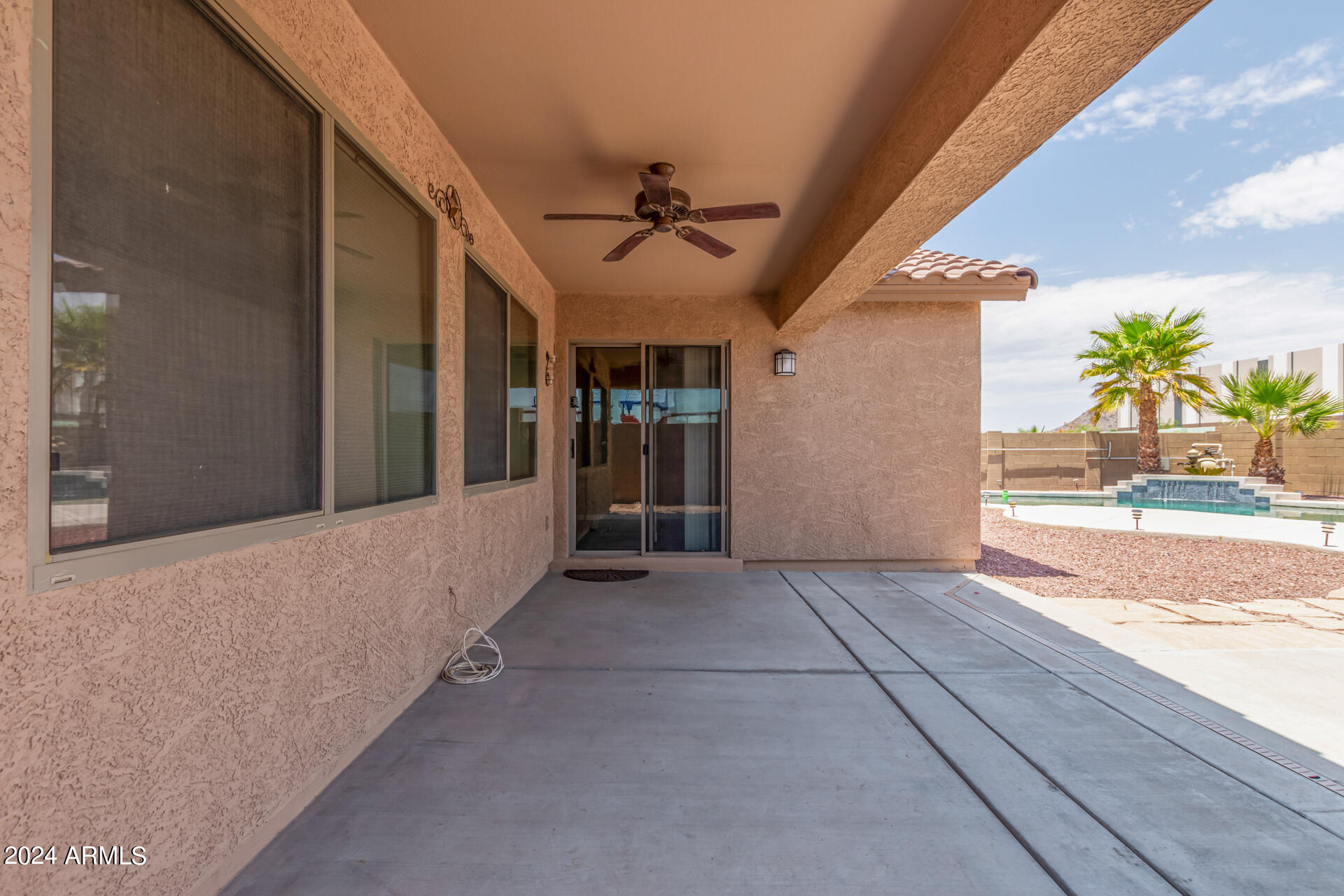 25602 West Ripple Road Buckeye, AZ 85326 - Photo 34 of 38 a view of a hallway with wooden floor