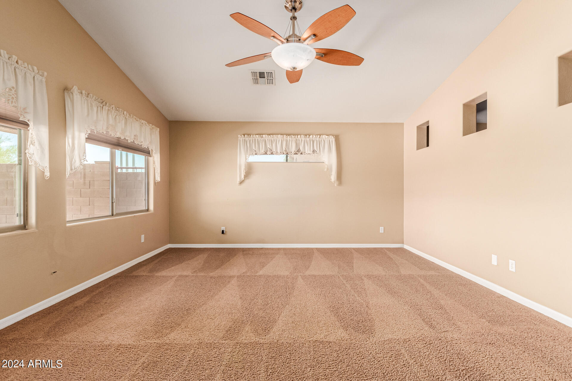 25602 West Ripple Road Buckeye, AZ 85326 - Photo 6 of 38 a view of an empty room with a window