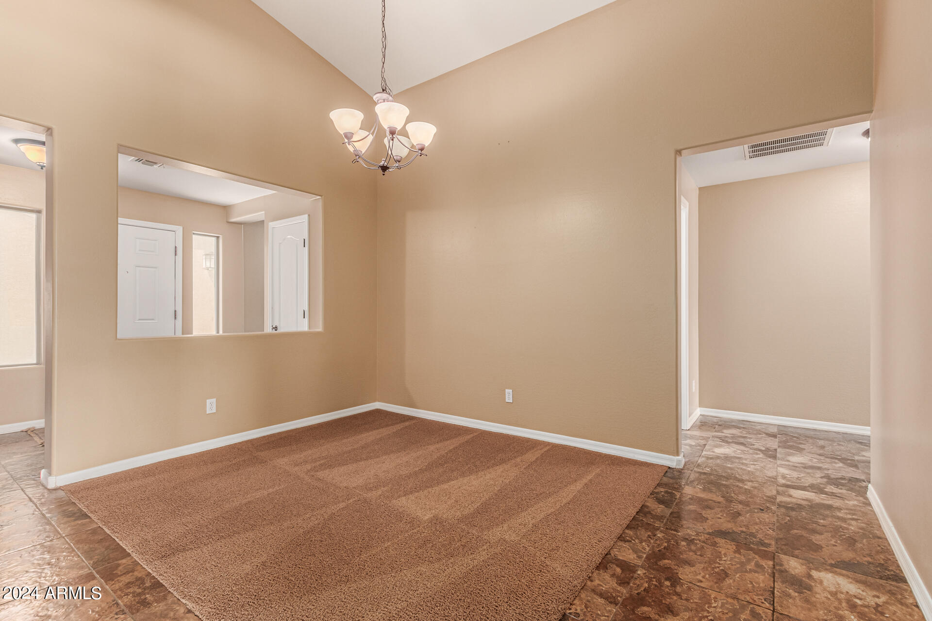 25602 West Ripple Road Buckeye, AZ 85326 - Photo 9 of 38 a view of empty room with window