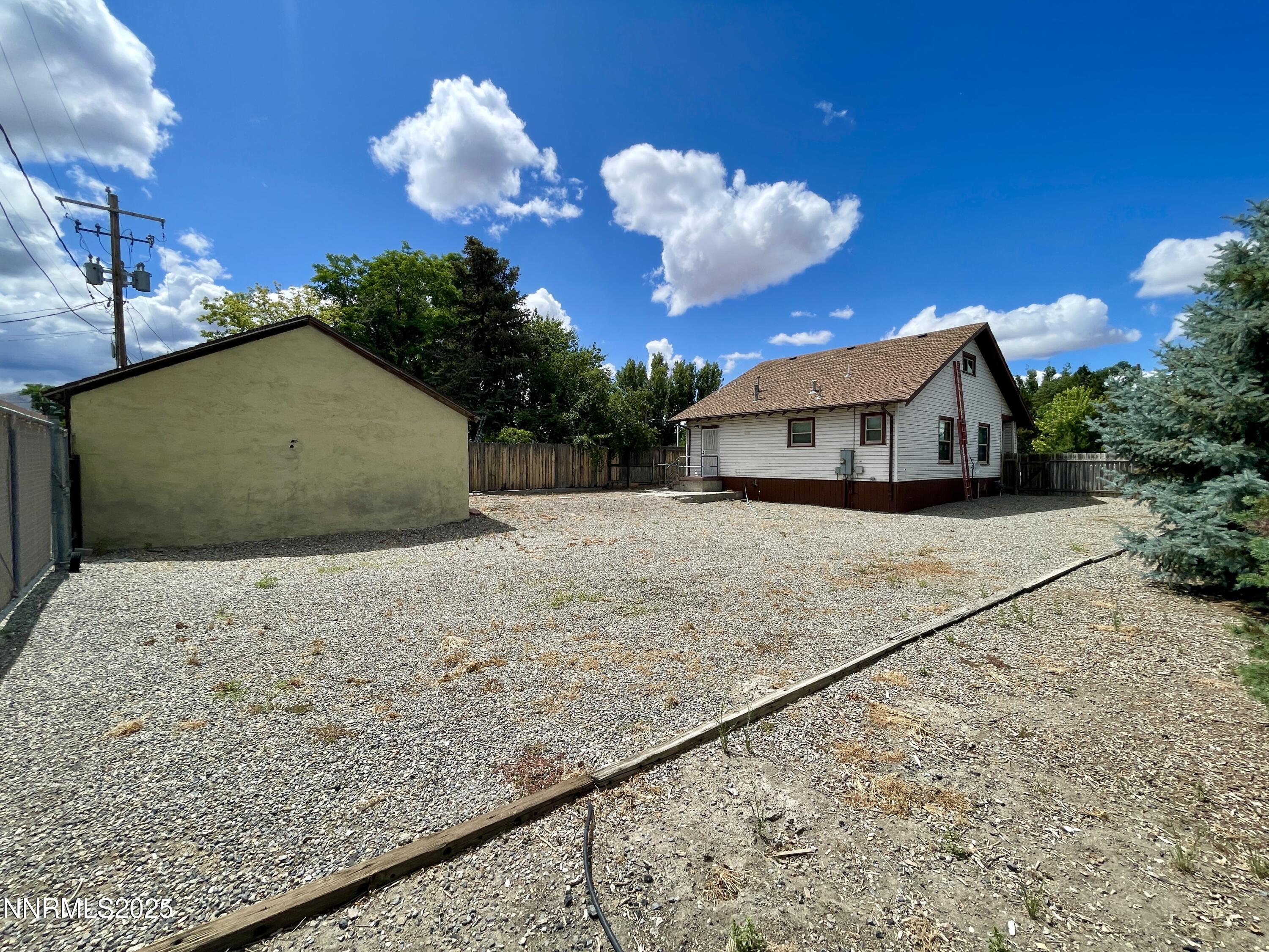 77 Lay Street Winnemucca, NV 89445 - Photo 28 of 28 a view of a house with a yard