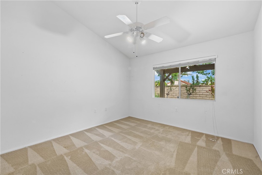 2095 Tulip Avenue Simi Valley, CA 93063 - Photo 27 of 39 an empty room with a window and ceiling fan