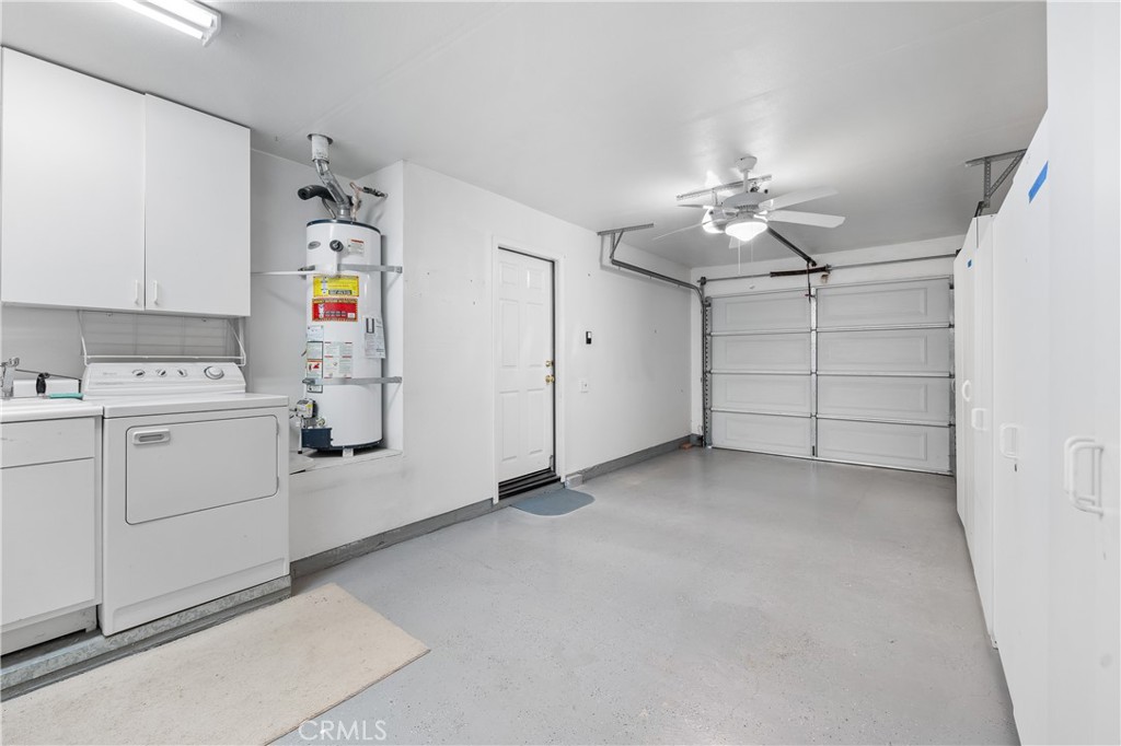 2095 Tulip Avenue Simi Valley, CA 93063 - Photo 28 of 39 a view of cabinets and utility room with ceiling fan