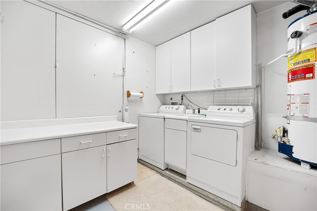 2095 Tulip Avenue Simi Valley, CA 93063 - Photo 30 of 39 a utility room with dryer and washer
