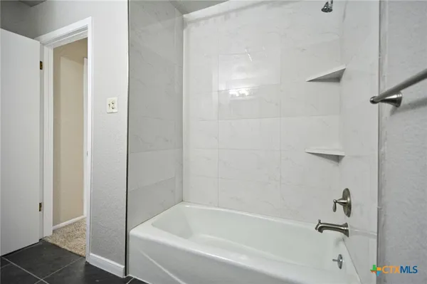 a bathroom with a bathtub