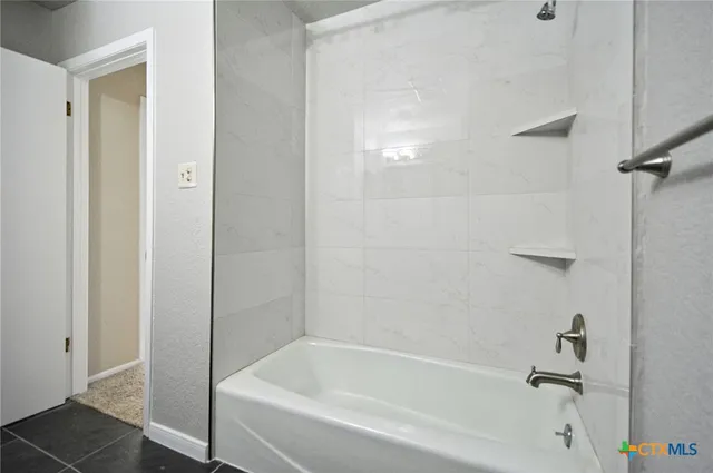 a bathroom with a bathtub