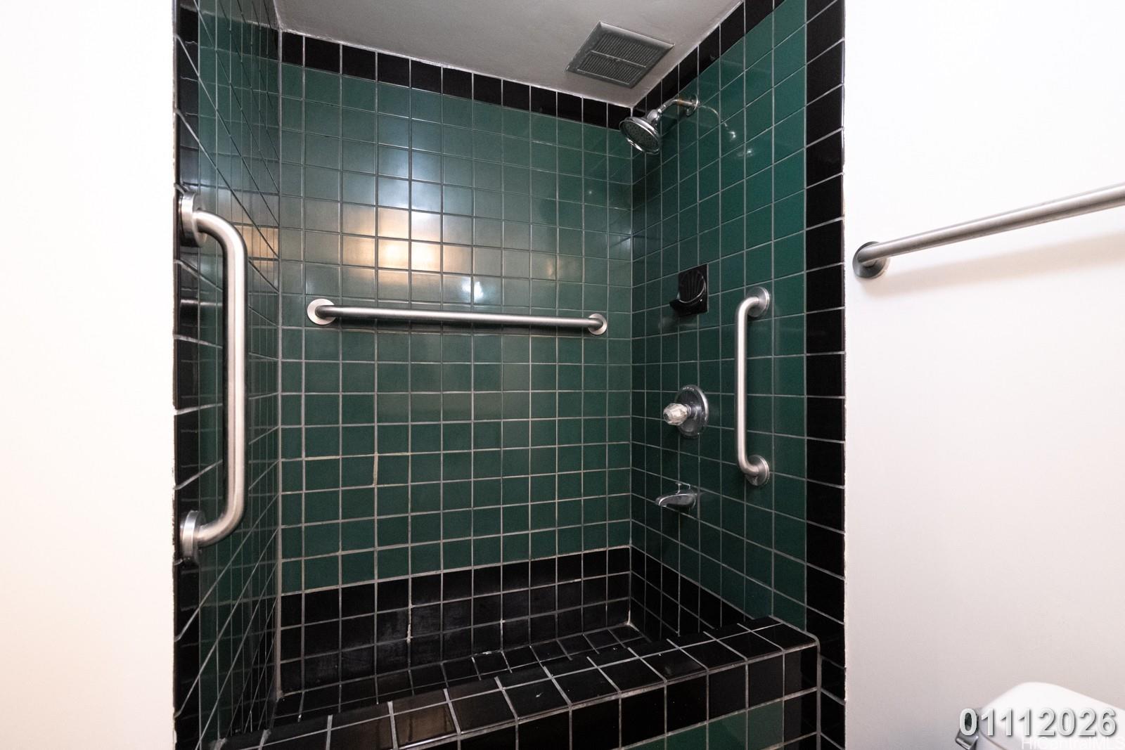 469 Ena Road, Unit 2903 Honolulu, HI 96815 - Photo 18 of 25 a bathroom with a shower