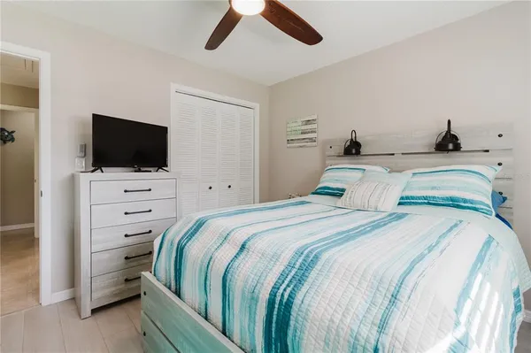 a house that has a big yard and large trees