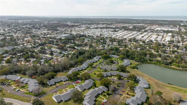 an aerial view of residential building with parking space