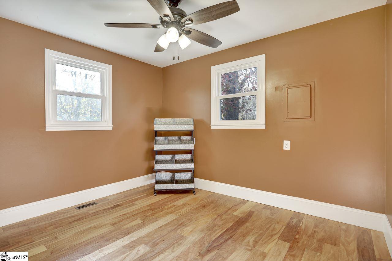 4916 State Park Road Travelers Rest, SC 29690 - Photo 21 of 34 Private office with attached bathroom. This private office and serve many functions, it has an attached private bathroom so you can get your work done. This is a perfect answer to the new remote office reality. 10 steps make the perfect commute