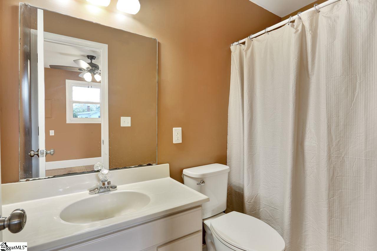 4916 State Park Road Travelers Rest, SC 29690 - Photo 23 of 34 Private office with attached bathroom. This private office and serve many functions, it has an attached private bathroom so you can get your work done. This is a perfect answer to the new remote office reality. 10 steps make the perfect commute