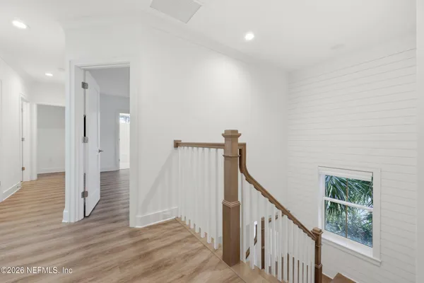 a view of entryway with wooden floor