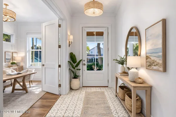 a view of living room and dining room