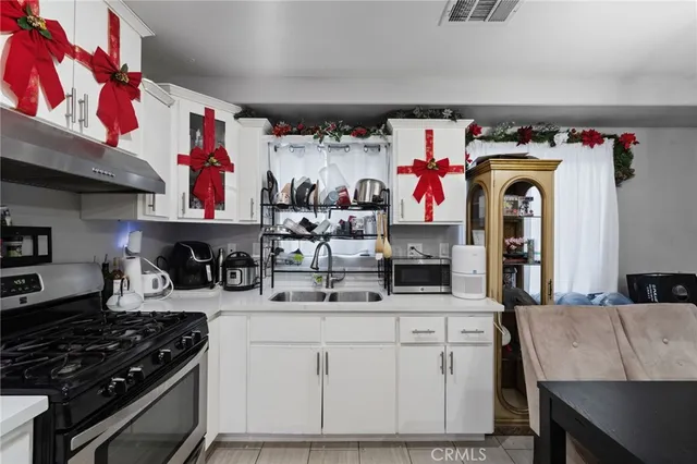 a bedroom with a bed and cabinets
